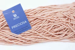 11SB933-PM: Preciosa Czech Seed Bead Permalux Apricot Matte 11/0 - 6 Hanks