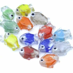 94FH212R: India Glass Fish Bead Clear With Multi Colored Stripes 24mm - 20 Pieces Per Package