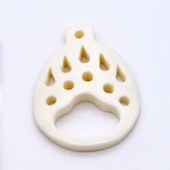 BN385-61: Bone Bear Paw Print Pendant Carved White 35x45mm - 5 Pieces