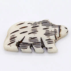 BN385-79: Bone Bear Pendant Carved White/Black 45x26mm - 5 Pieces