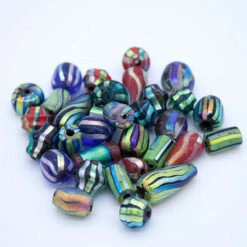 VE525-DIC: Bead Mix With Dichroic Stripes 15-35mm - Approximately 28 Pieces Per 250 Grams